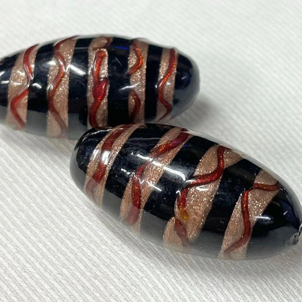 2 Vintage Black Metallic Red Striped Abstract Oval Glass Beads - Sea Beads