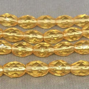 25 Golden Topaz Czech Faceted Oval Glass Beads - Sea Beads