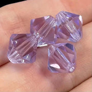 4 Violet Swarovski Bicone Crystal Beads - Sea Beads